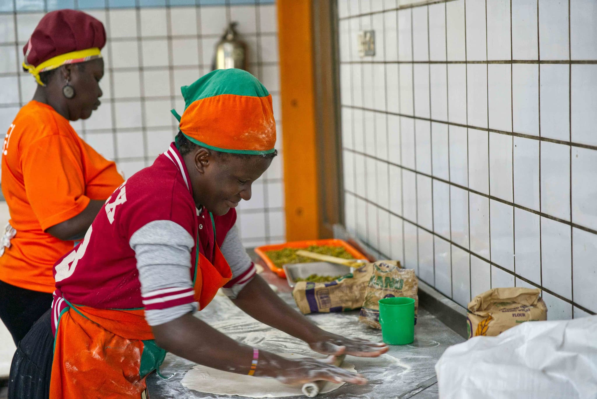 Bakers preparing bread dough